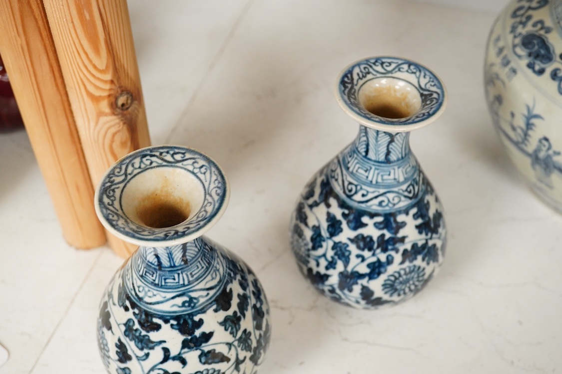 A pair of Chinese blue and white pear shaped vases, a similar jar and a Japanese bowl, largest 23cm in diameter